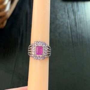 Purple gemstone and diamond CZ ring